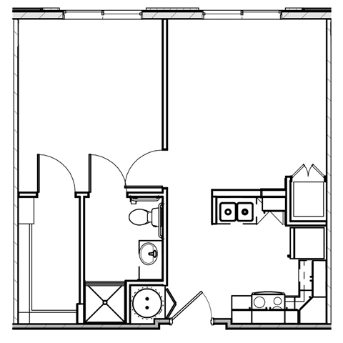 A black and white drawing of a floor plan with various rooms and objects.